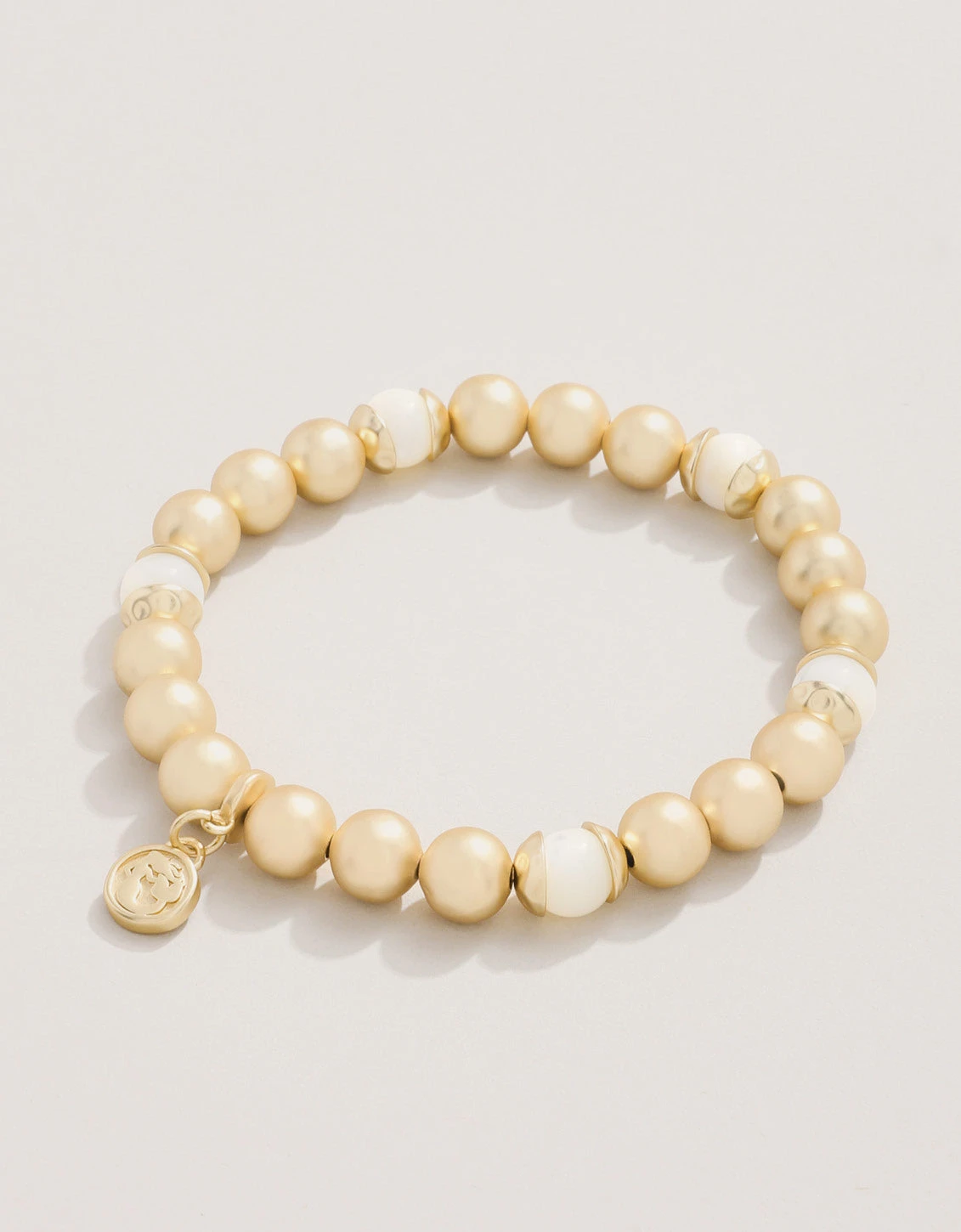 Golden Stretch Bracelet 8mm Mother-of-Pearl 1 Golden Stretch Bracelet 8mm Mother-of-Pearl